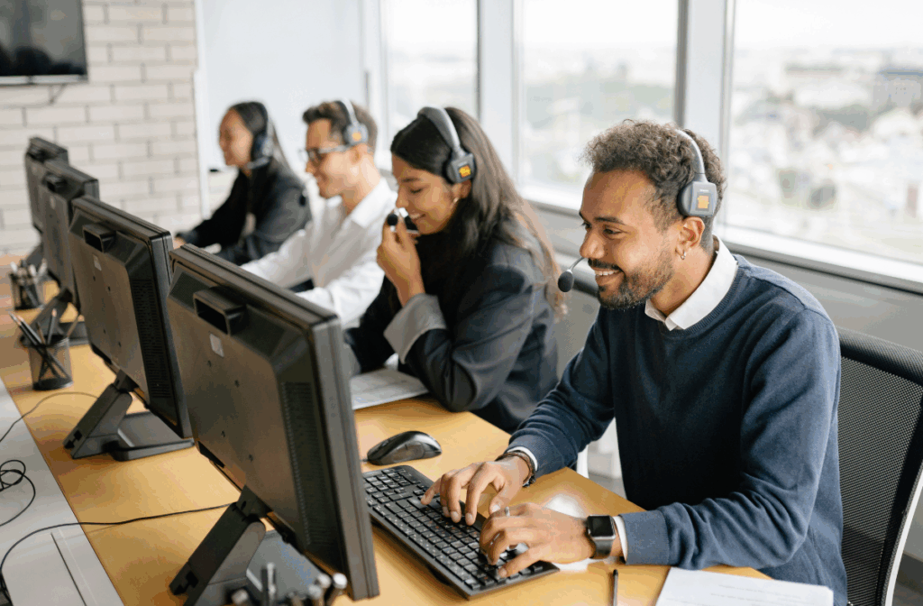 Contact centre staff sitting at a desk